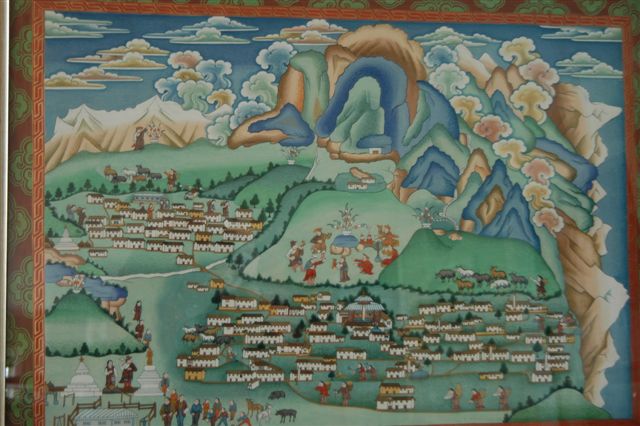Traditional Sherpa painting by Kapa Kalden depicting the villages of Khunde and Khumjung.  Khunde Hospital is visible top left and Khumjung School bottom left. 